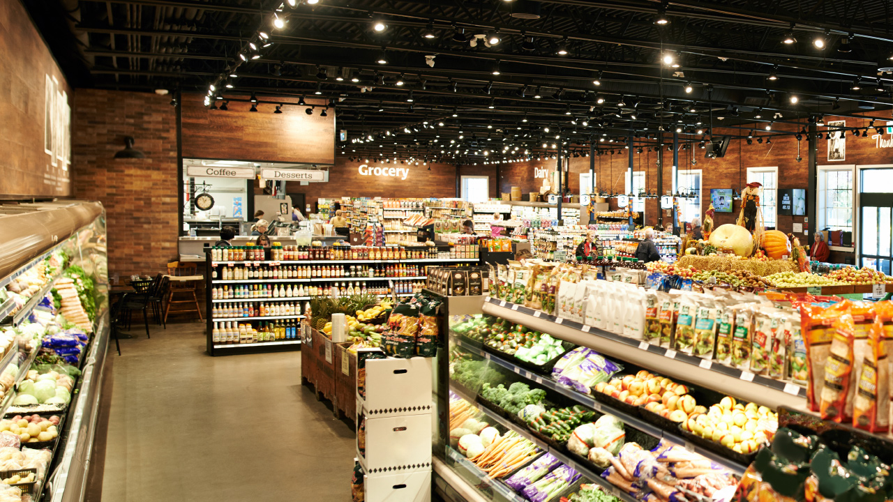 Supermarket aisle with fruits